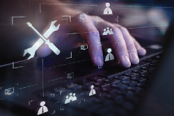 An image depicting a close-up of a person's hand interacting with a laptop keyboard. Overlay graphics, including tools and user icons, suggest a focus on technology and user management or maintenance tasks. The background features a digital interface, indicating an advanced technological environment.