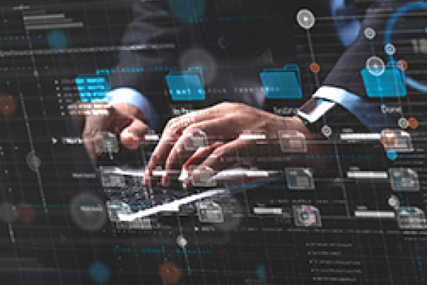 An image showing a person's hands typing on a laptop keyboard, partially obscured by a digital overlay that features various icons, including folders and data visualisations. The background suggests a sophisticated digital workspace, with graphical elements indicating data processing and file management. The individual is dressed in a formal suit, implying a professional setting.